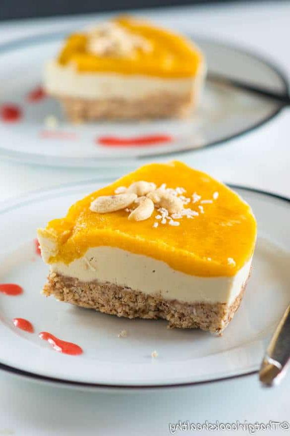 slice of no-bake mango cheesecake on a plate
