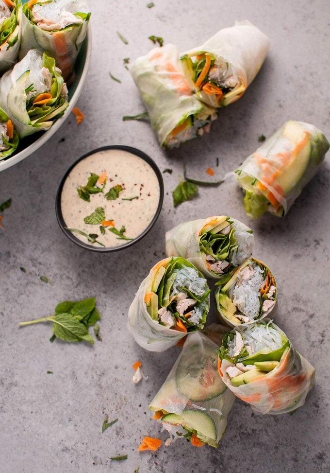several leftover chicken salad rolls with bowl of miso tarragon dipping sauce