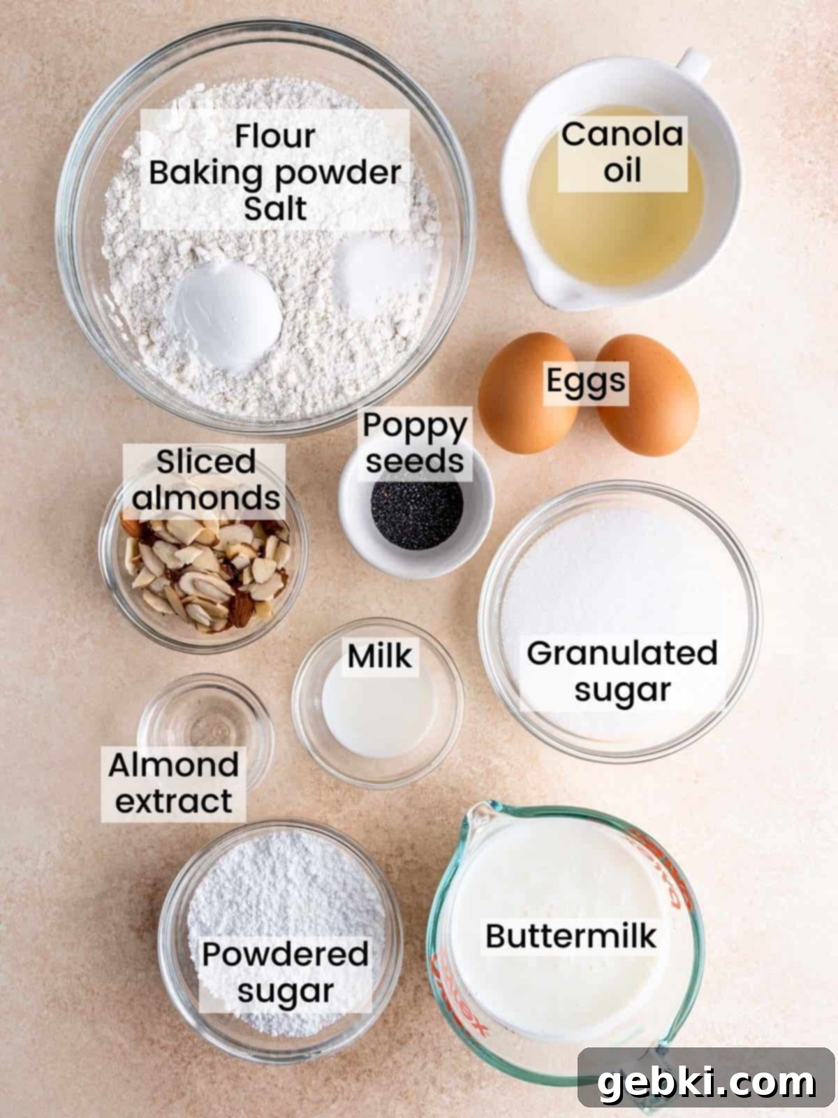 Irresistible Almond Poppy Seed Muffins 3 Ingredients needed to make almond poppy seed muffins, neatly arranged on a counter.