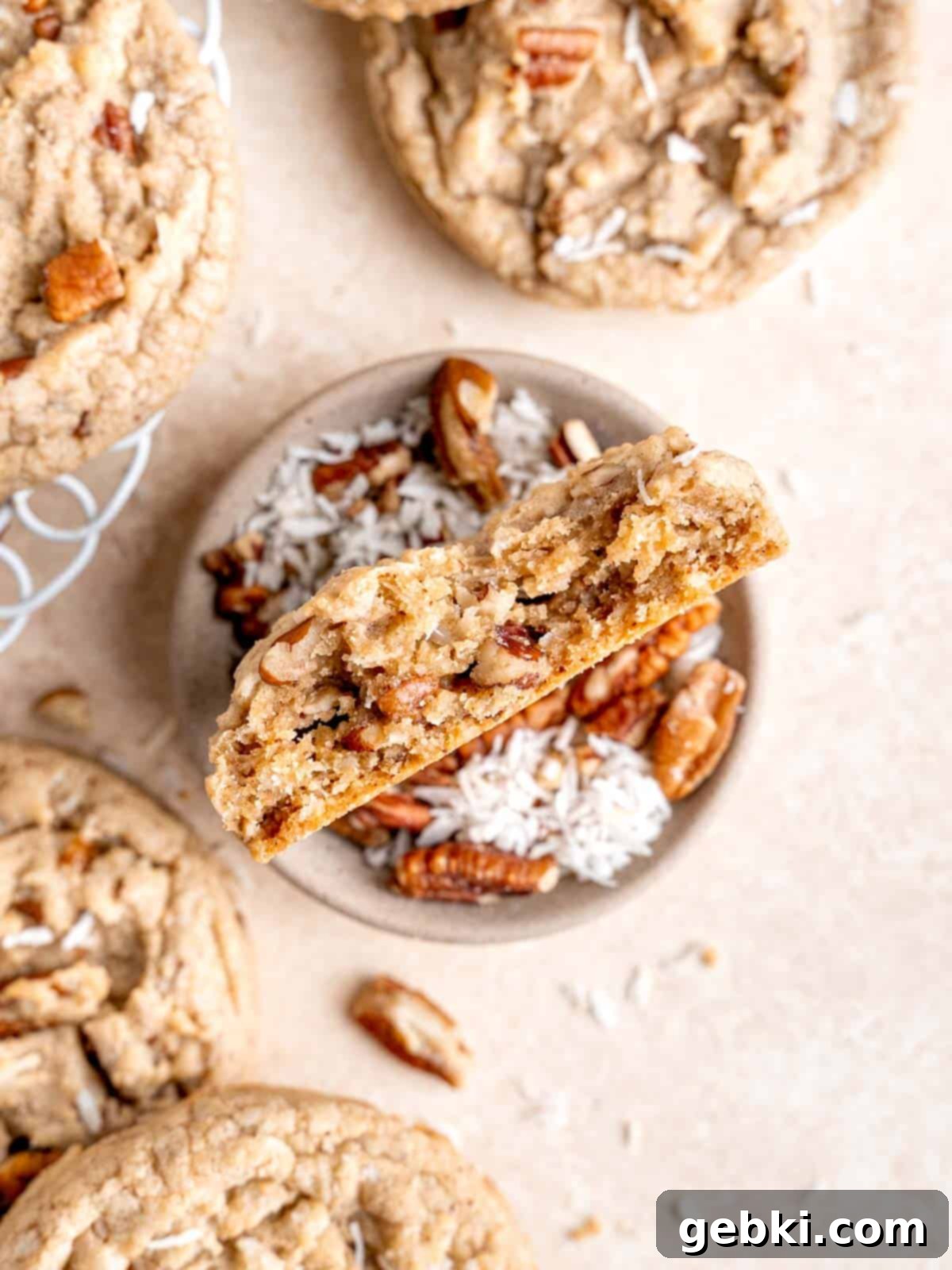 Close up of the inside of a coconut pecan cookie.