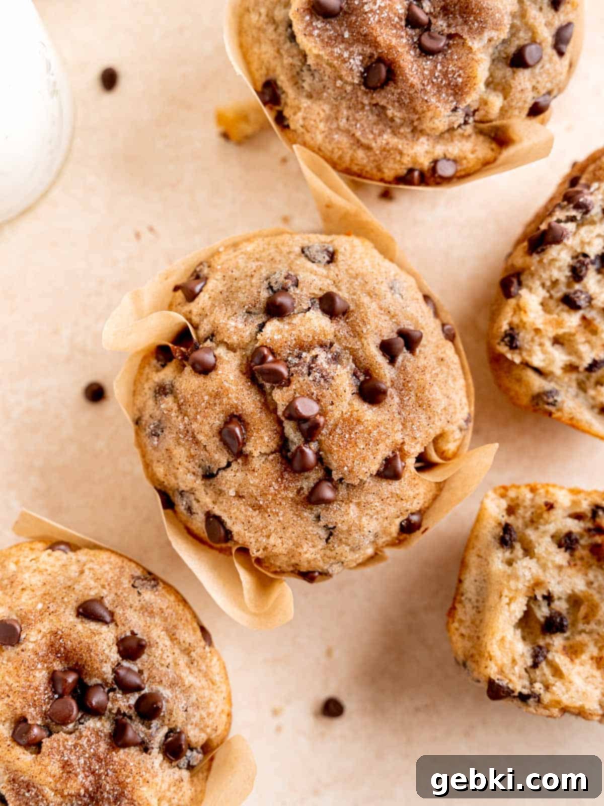 Chocolate chip muffin tops sprinkled in cinnamon sugar.