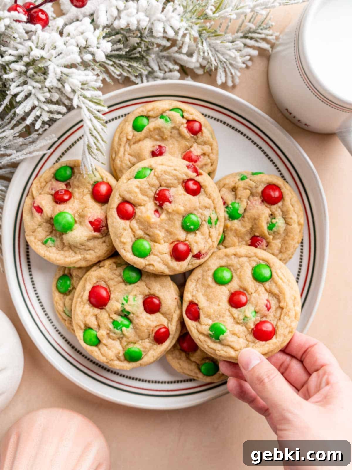 Soft sugar cookies with red and green Christmas M&Ms, ready for a festive holiday.