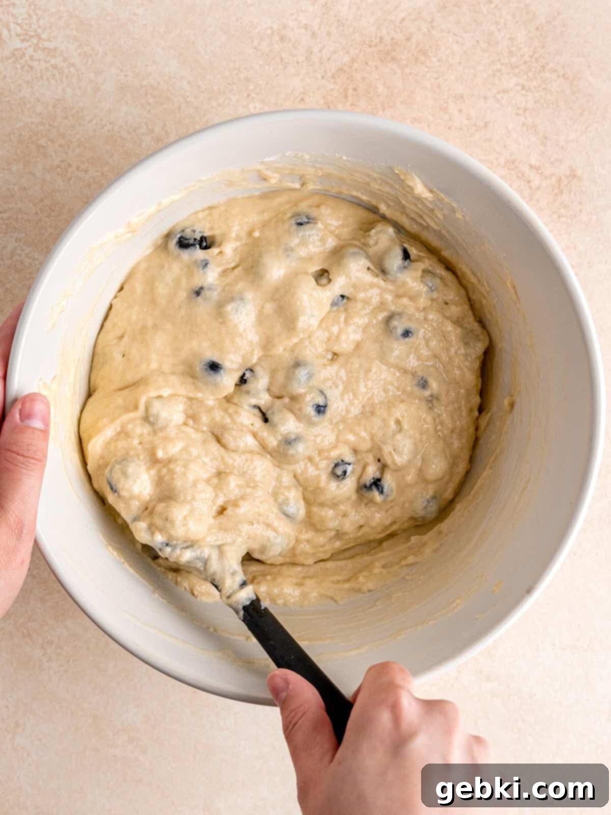 Ultimate Sourdough Discard Blueberry Muffins 6 Sourdough discard muffin batter with blueberries.