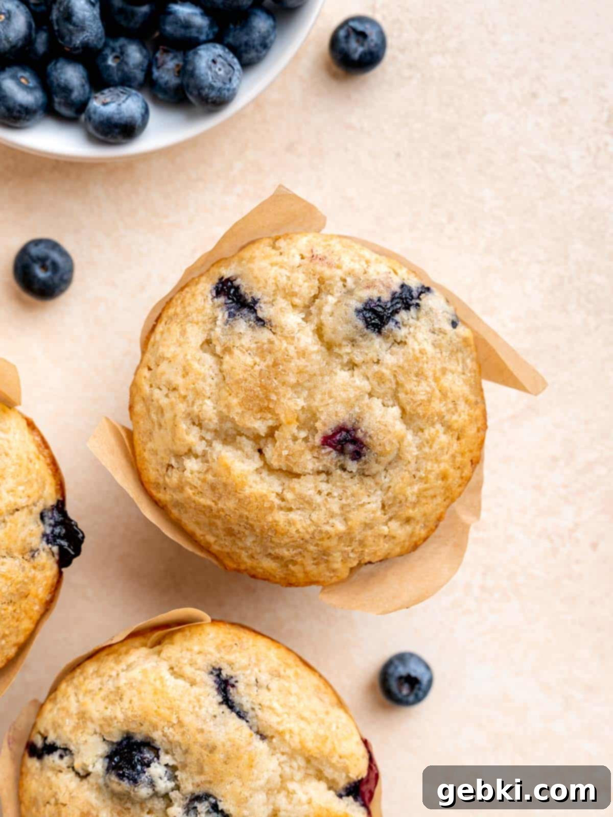 Ultimate Sourdough Discard Blueberry Muffins 8 Top view of a blueberry sourdough muffin.