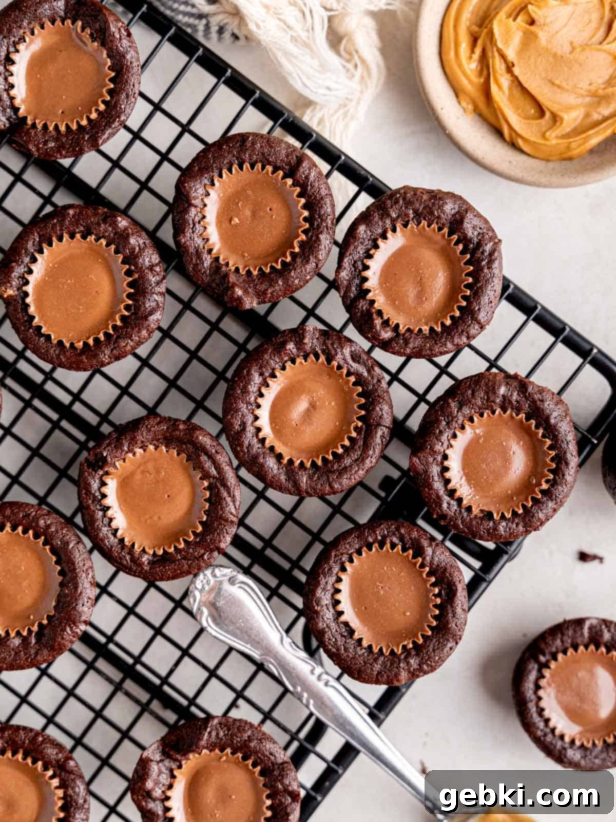 Peanut Butter Cup Brownie Bites 8 Top view of peanut butter cup brownie bites on a cooling rack.