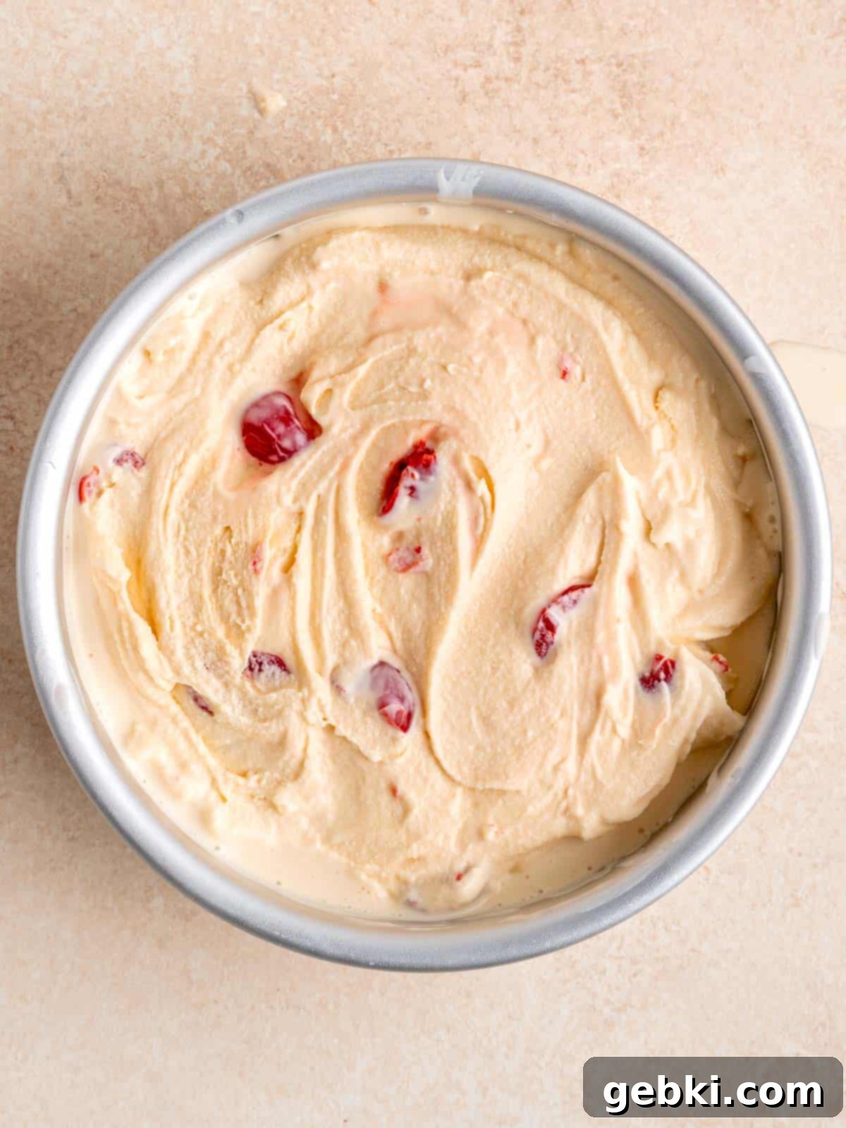Amaretto Cherry Bliss 9 Amaretto ice cream with cherries in a pan.