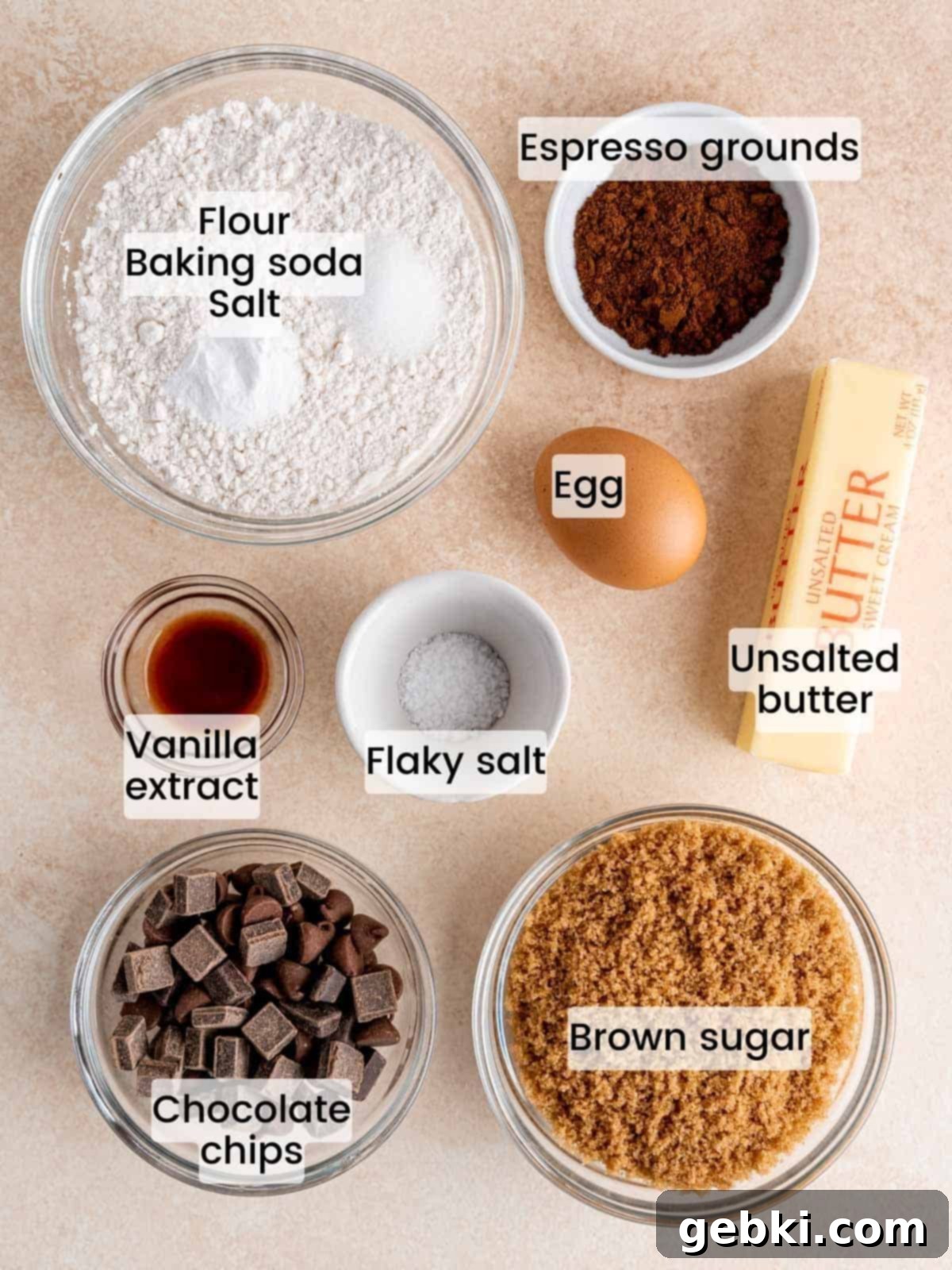 Espresso Sea Salt Chocolate Chip Cookies 3 Ingredients needed to make salted espresso chocolate chip cookies, including butter, espresso grounds, chocolate chips, and flour.