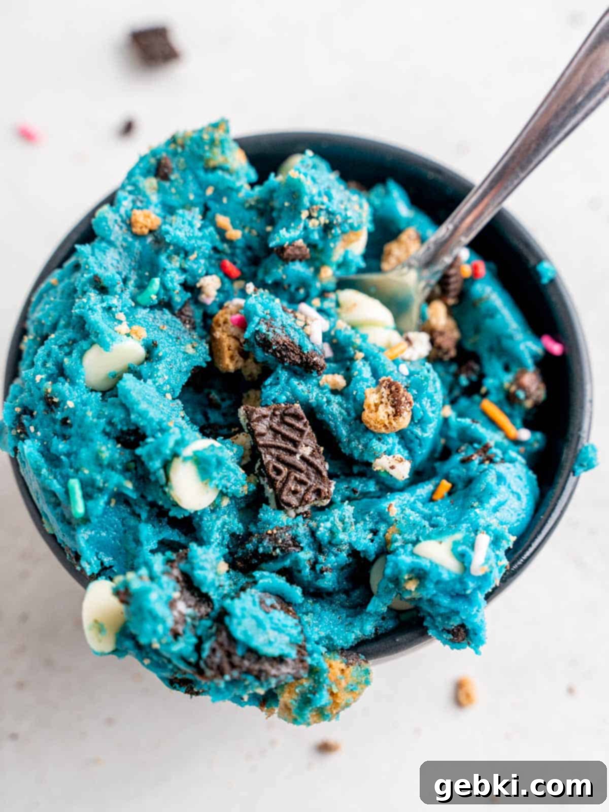 Cookie Monster Edible Cookie Dough in a bowl with a spoon.