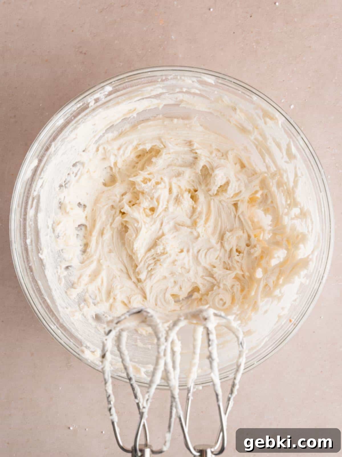 Pillowy Sour Cream Cookies with Sweet Frosting 8 Vanilla buttercream mixed in a bowl.