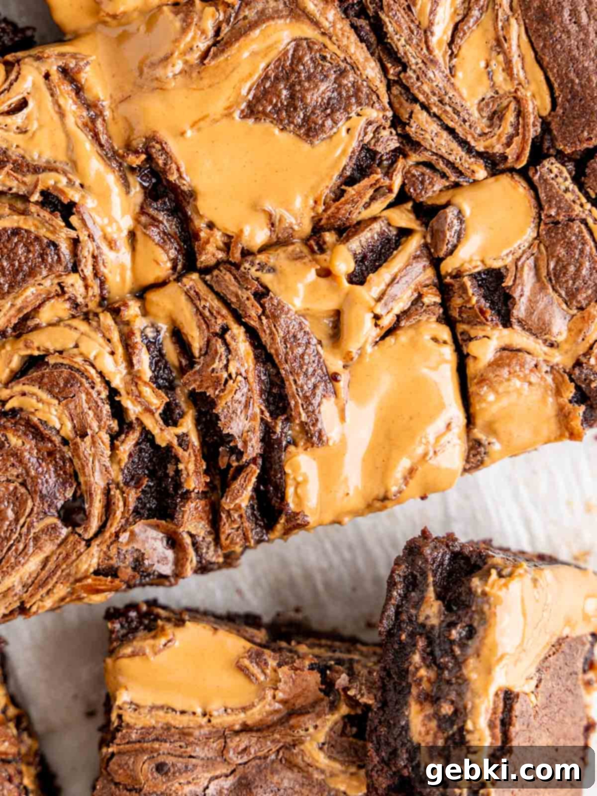 Top view of fudgy chocolate peanut butter swirl brownies, ready to be enjoyed.