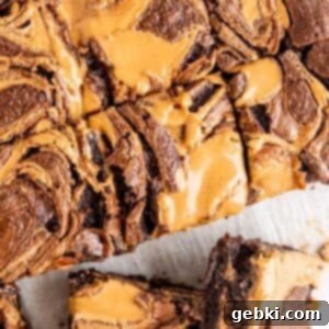 Close-up top view of the finished chocolate peanut butter brownies with distinct swirls.