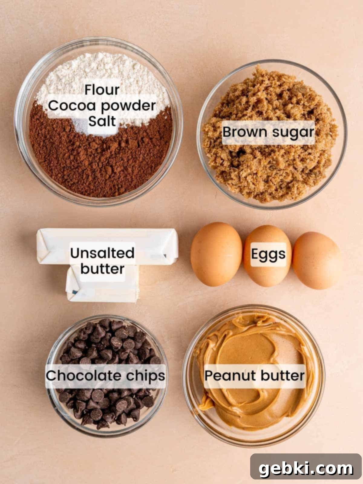 Essential ingredients displayed for making homemade chocolate peanut butter brownies.