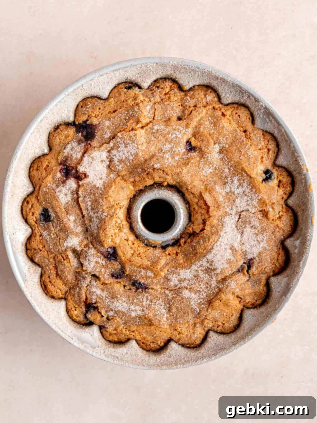 Irresistible Blueberry Sour Cream Coffee Cake 9 Blueberry sour cream coffee cake baked in a bundt pan.