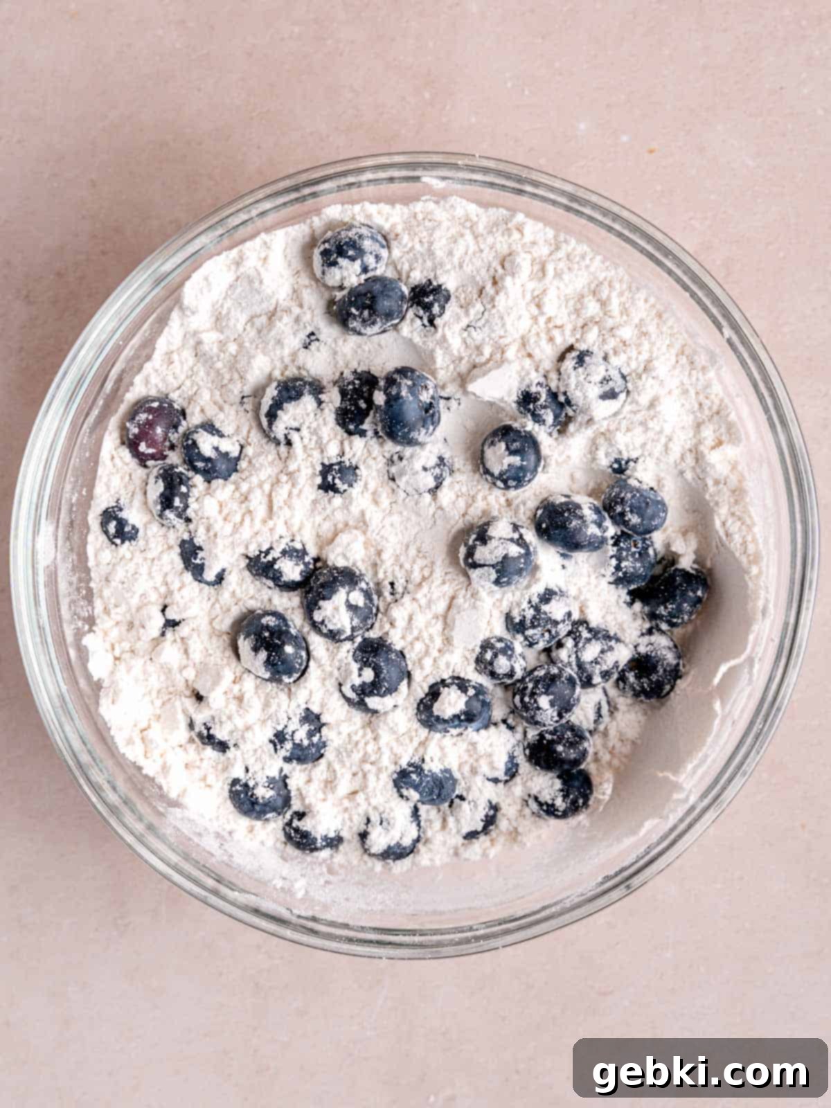 Irresistible Blueberry Banana Muffins 4 Blueberries tossed in a mixture of flour, baking powder, baking soda, and salt.