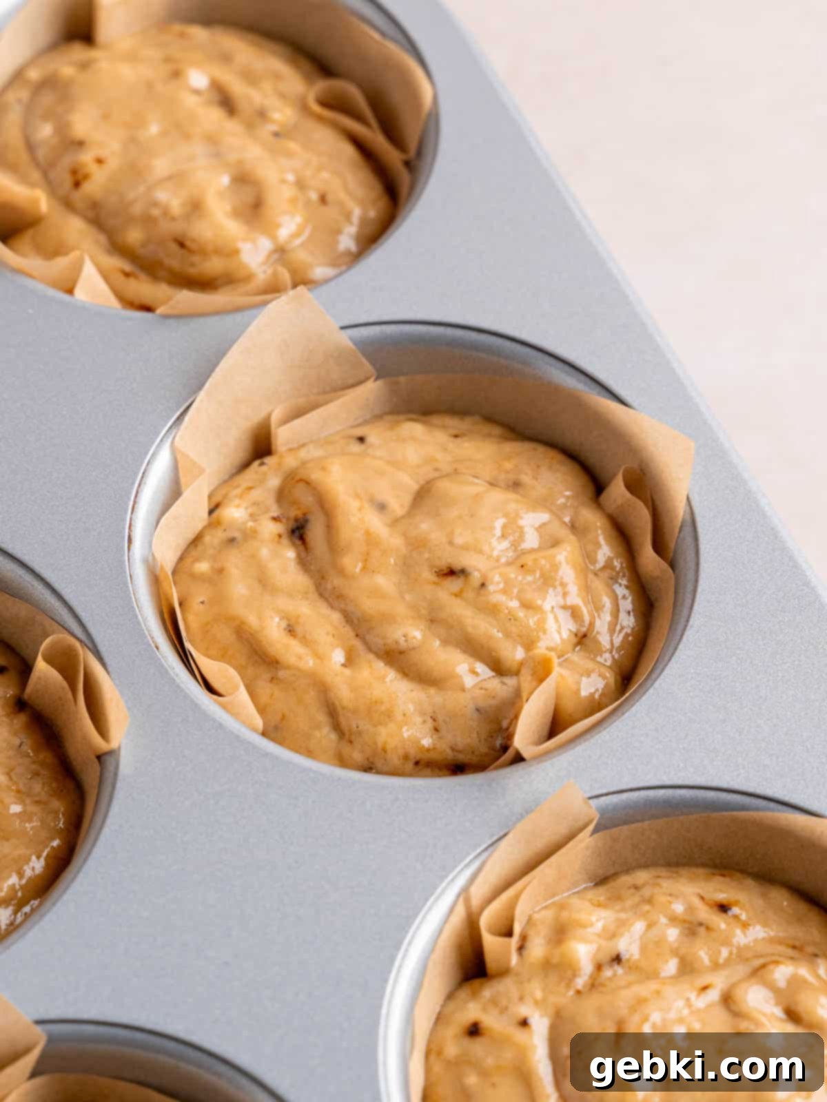 Espresso Muffins with Chocolate Streusel 8 A jumbo muffin pan filled with coffee muffin batter, ready for topping.
