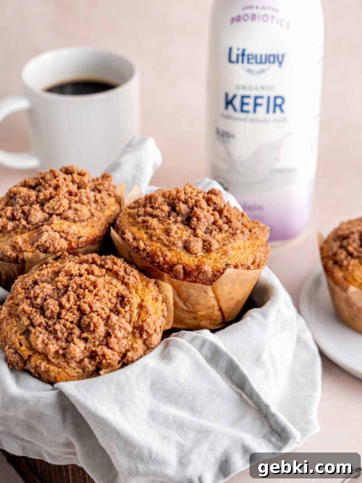 Espresso Muffins with Chocolate Streusel 10 A basket of coffee-flavored streusel muffins next to a bottle of Lifeway kefir, highlighting the key ingredient.