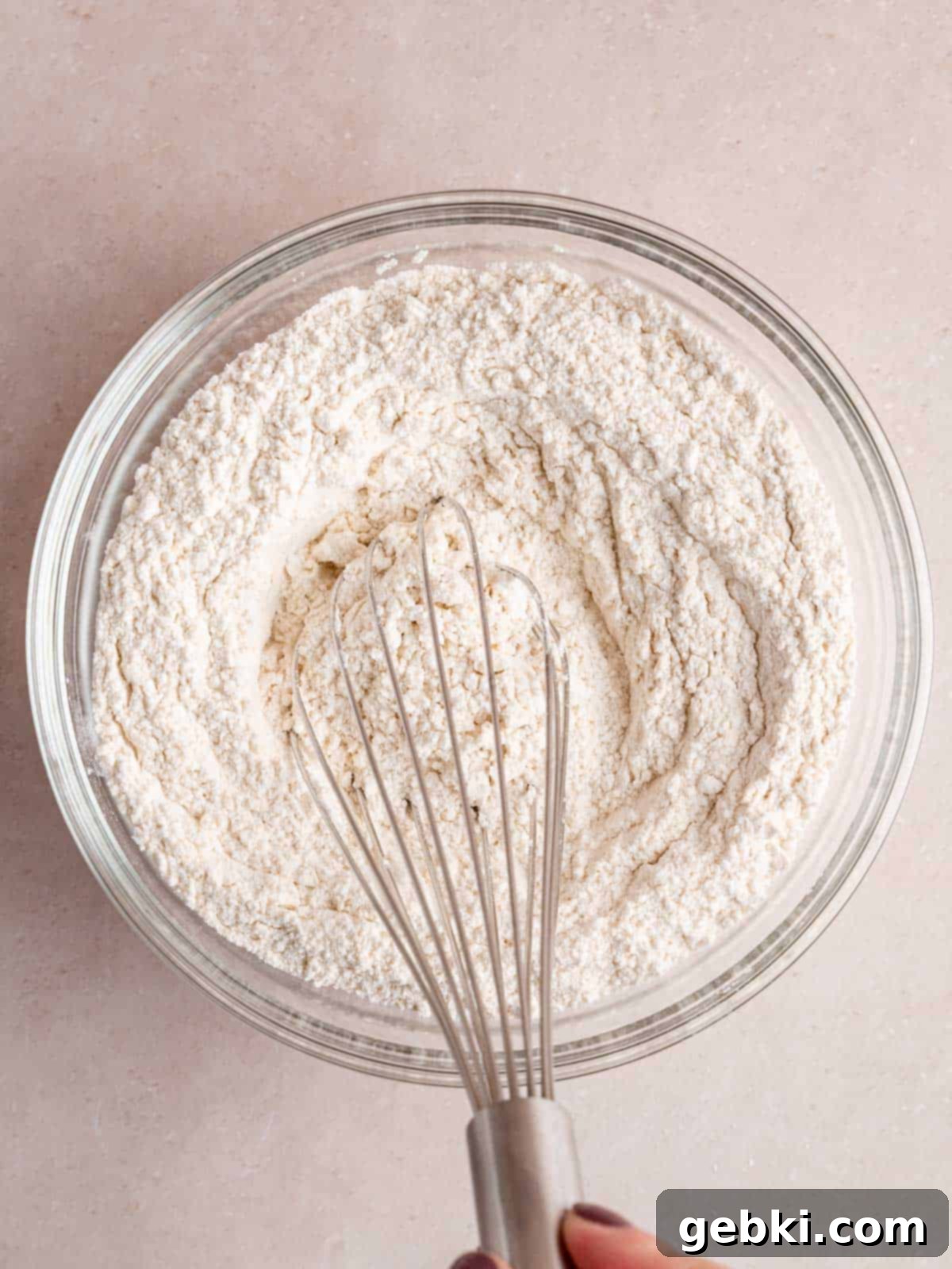 Quick and Easy Strawberry Muffins 4 Whisking flour, baking powder, and salt together in a bowl.