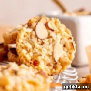 A beautifully baked shortbread cookie with almond filling and a golden sliced almond topping.