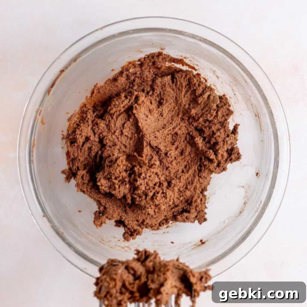 Irresistible Chewy Andes Mint Chocolate Cookies 5 Chocolate cookie dough in a bowl.