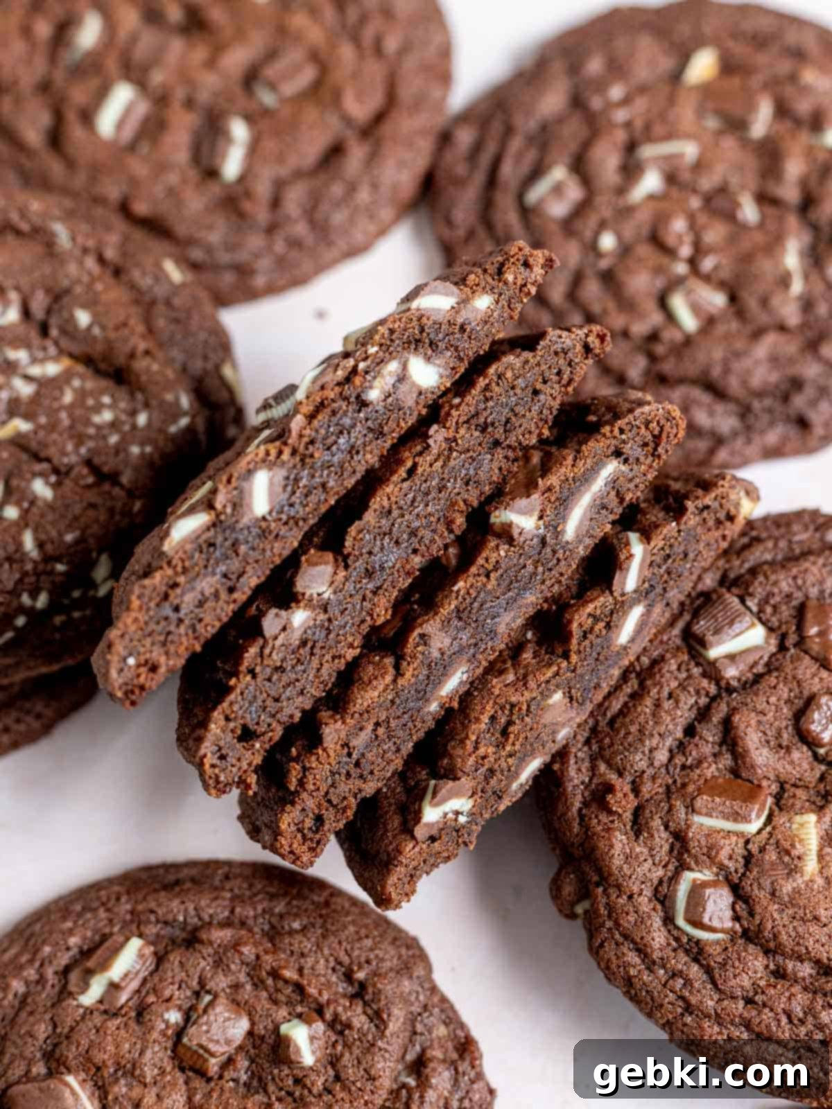 Irresistible Chewy Andes Mint Chocolate Cookies 8 Andes mint chocolate cookies cut in half showing the chewy centers.
