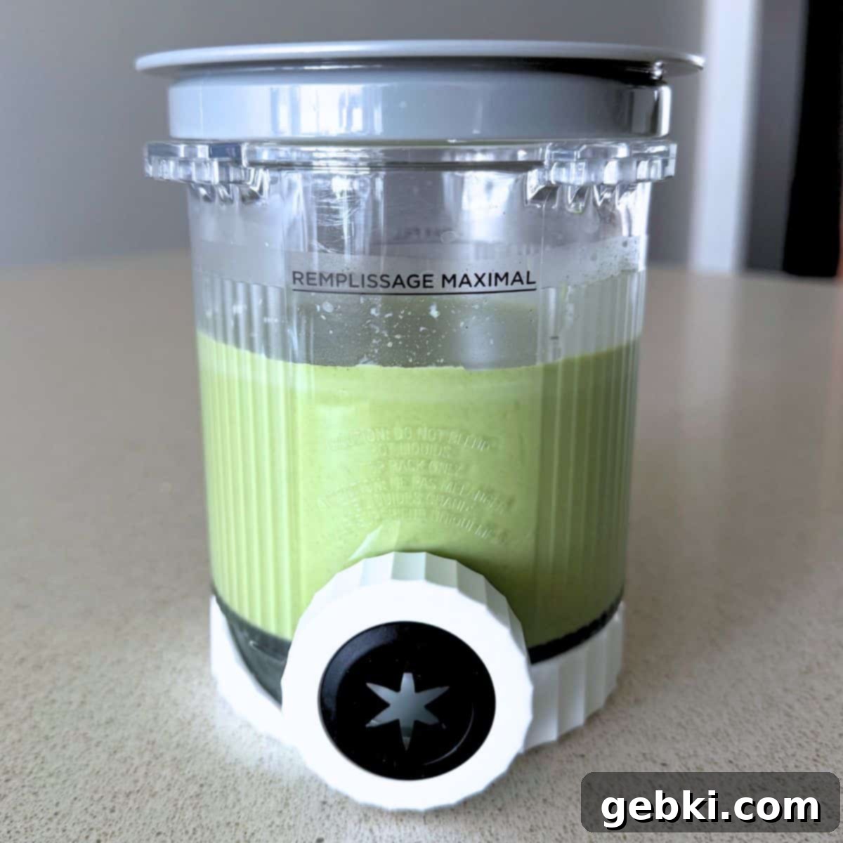 Strawberry Matcha Ninja Creami Treat 8 A mixture of milk, matcha, sugar, and heavy cream in a Ninja Creami Swirl pint.