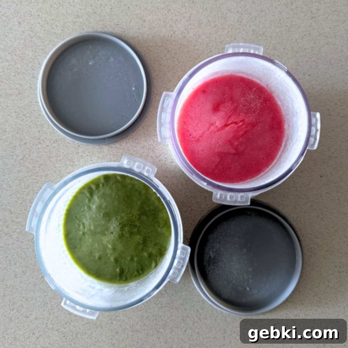 Strawberry Matcha Ninja Creami Treat 9 Matcha and strawberry ice cream mixtures frozen in Ninja Creami pints.
