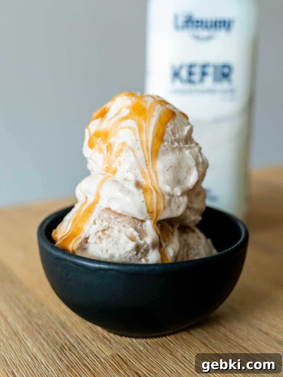 Ninja Creami Apple Pie Delight 9 Caramel apple ice cream next to a bottle of Lifeway Kefir, highlighting the key ingredient.