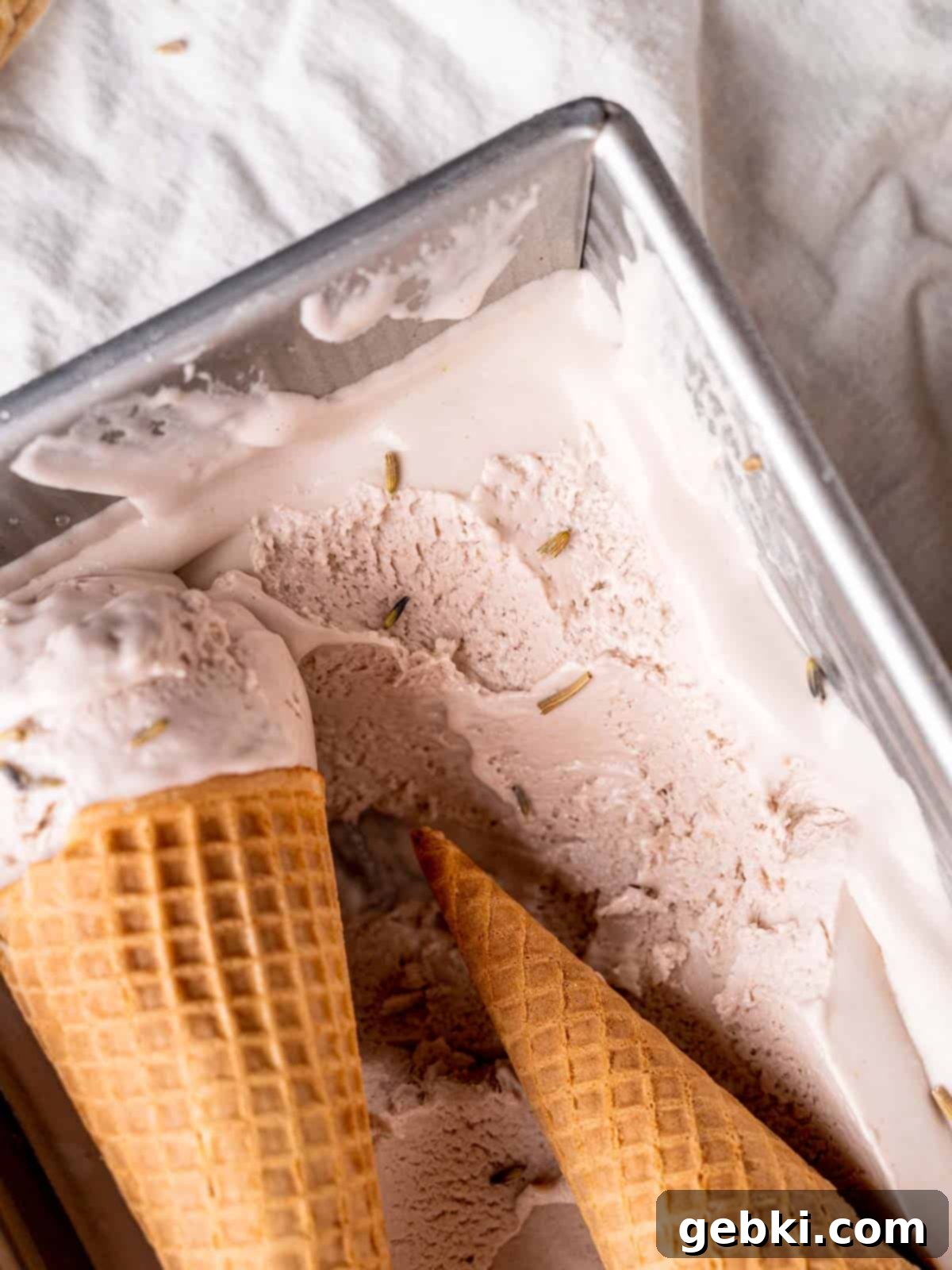 Lavender Honey Dream 9 Honey lavender ice cream in a loaf pan with sugar cones.
