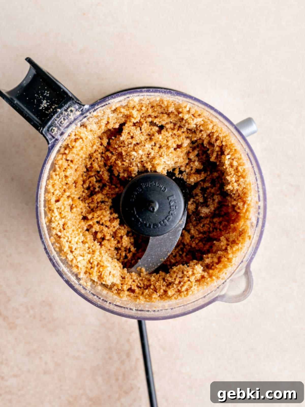Graham cracker crumbs in a food processor.
