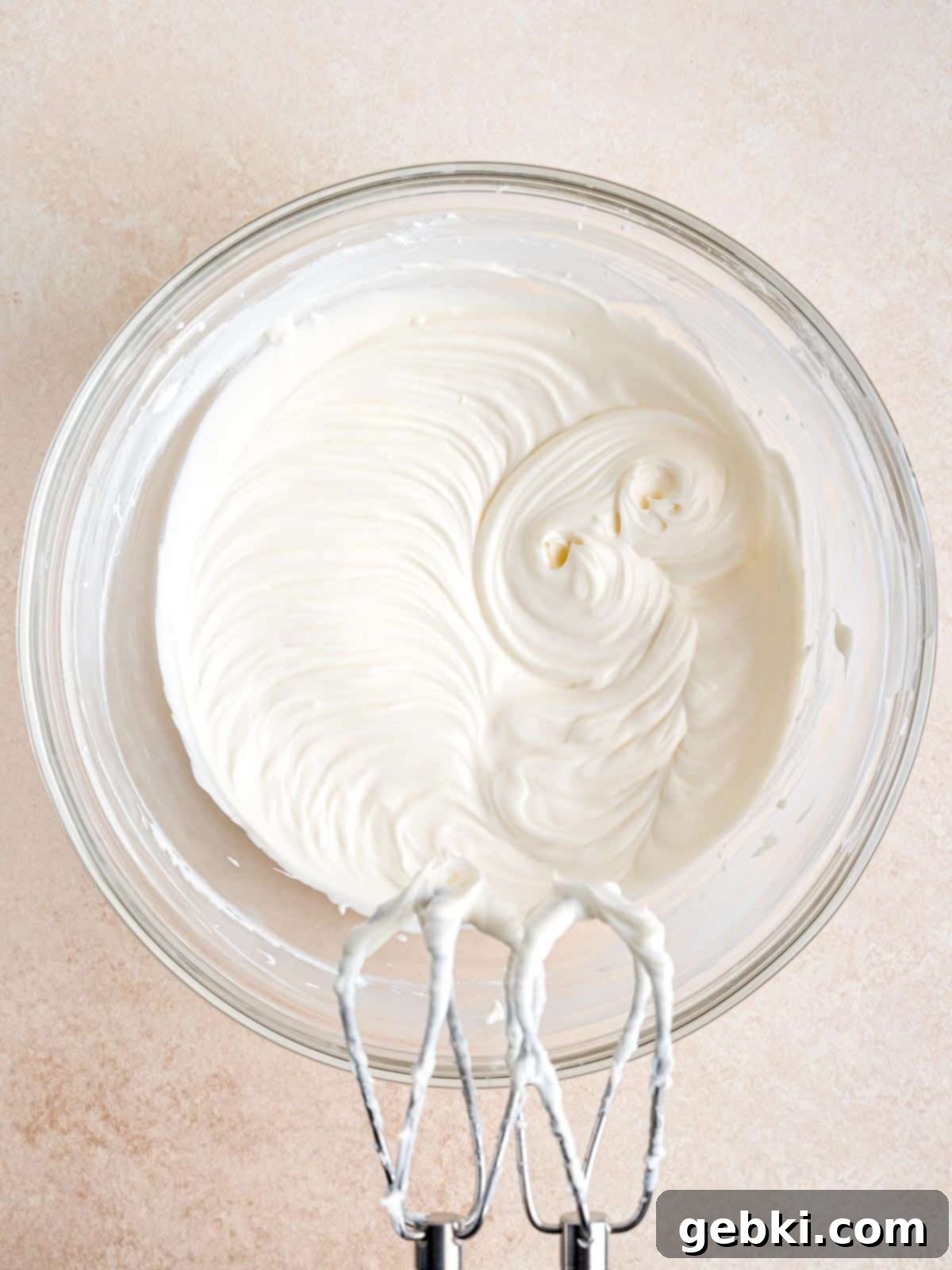 Sour cream, sugar, vanilla extract and lemon juice mixed into smooth cream cheese.