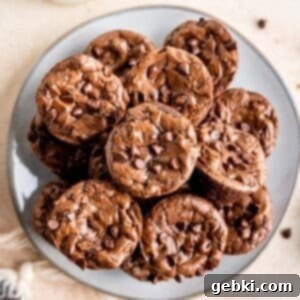 Perfectly Poppable Brownies 7 Mini brownie bites on a plate.