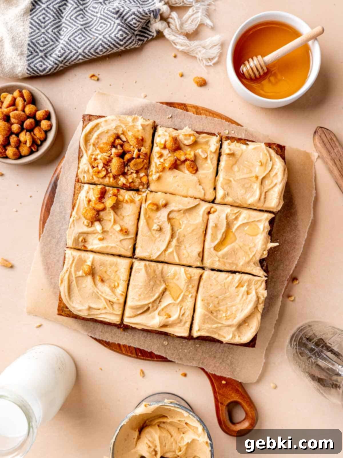The Easiest Frosted Banana Cake Ever 9 Top view of an 8x8 inch banana cake with frosting cut into 9 squares.