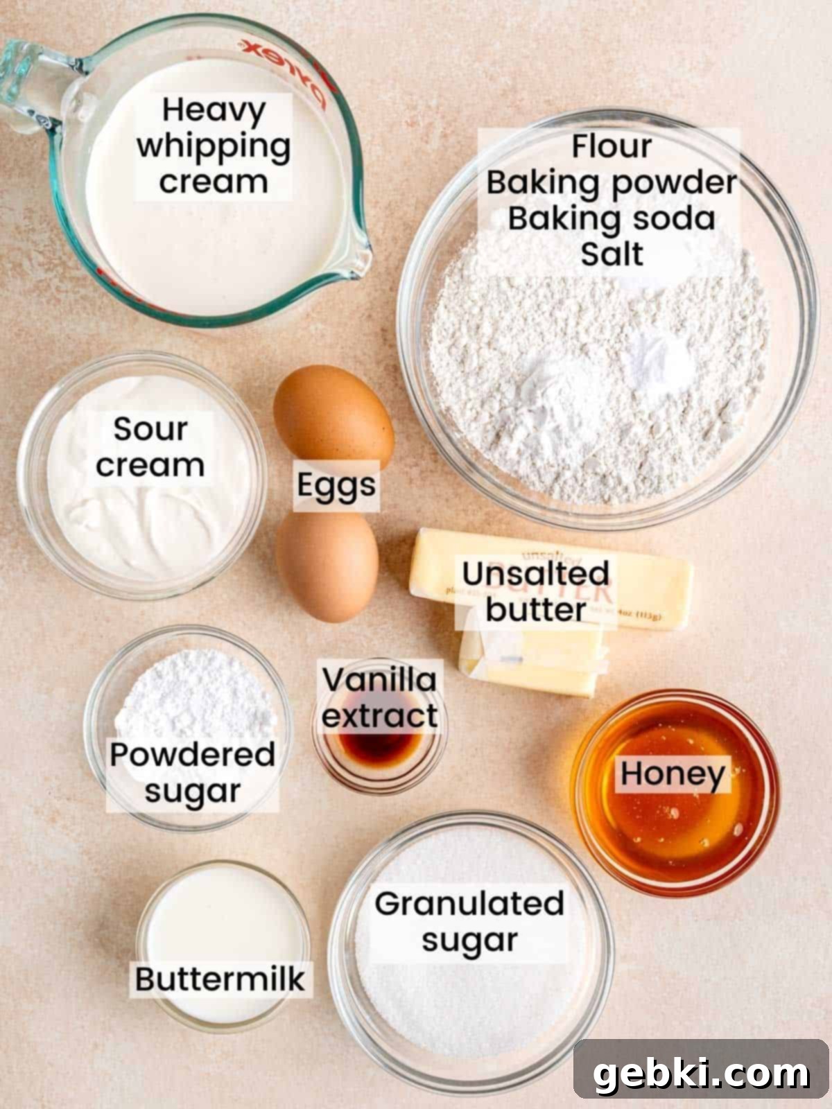 Effortless Honey Vanilla Delight 3 Ingredients needed to make a honey vanilla cake with homemade whipped cream, laid out on a white surface.