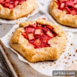 Close up of a mini strawberry rhubarb galette.