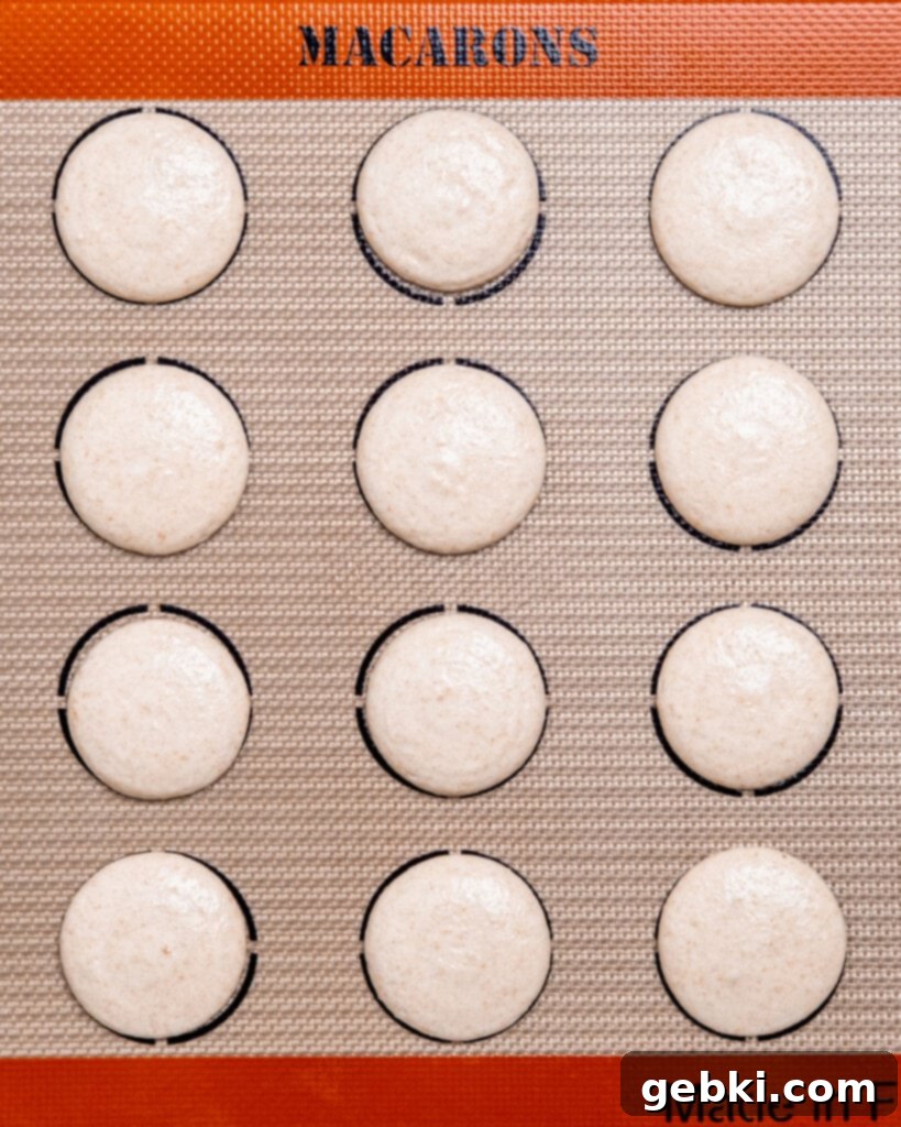 Macaron batter forming a 'figure 8' during macaronage.