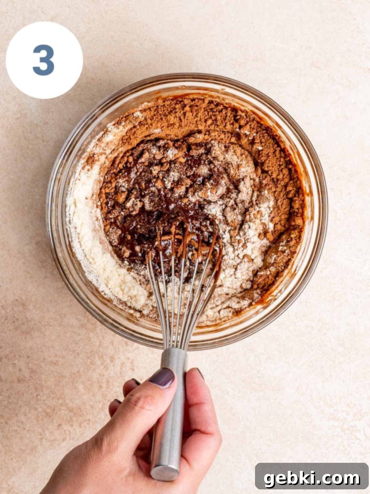 Spoonable Brownie Delight 6 Step 3: Cocoa powder and vanilla protein powder being mixed into the brownie batter base.
