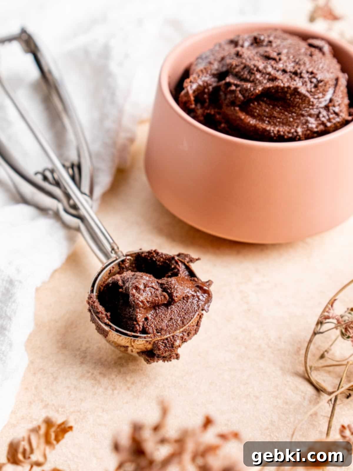 Spoonable Brownie Delight 8 close up of a cookie scoop with brownie batter in it