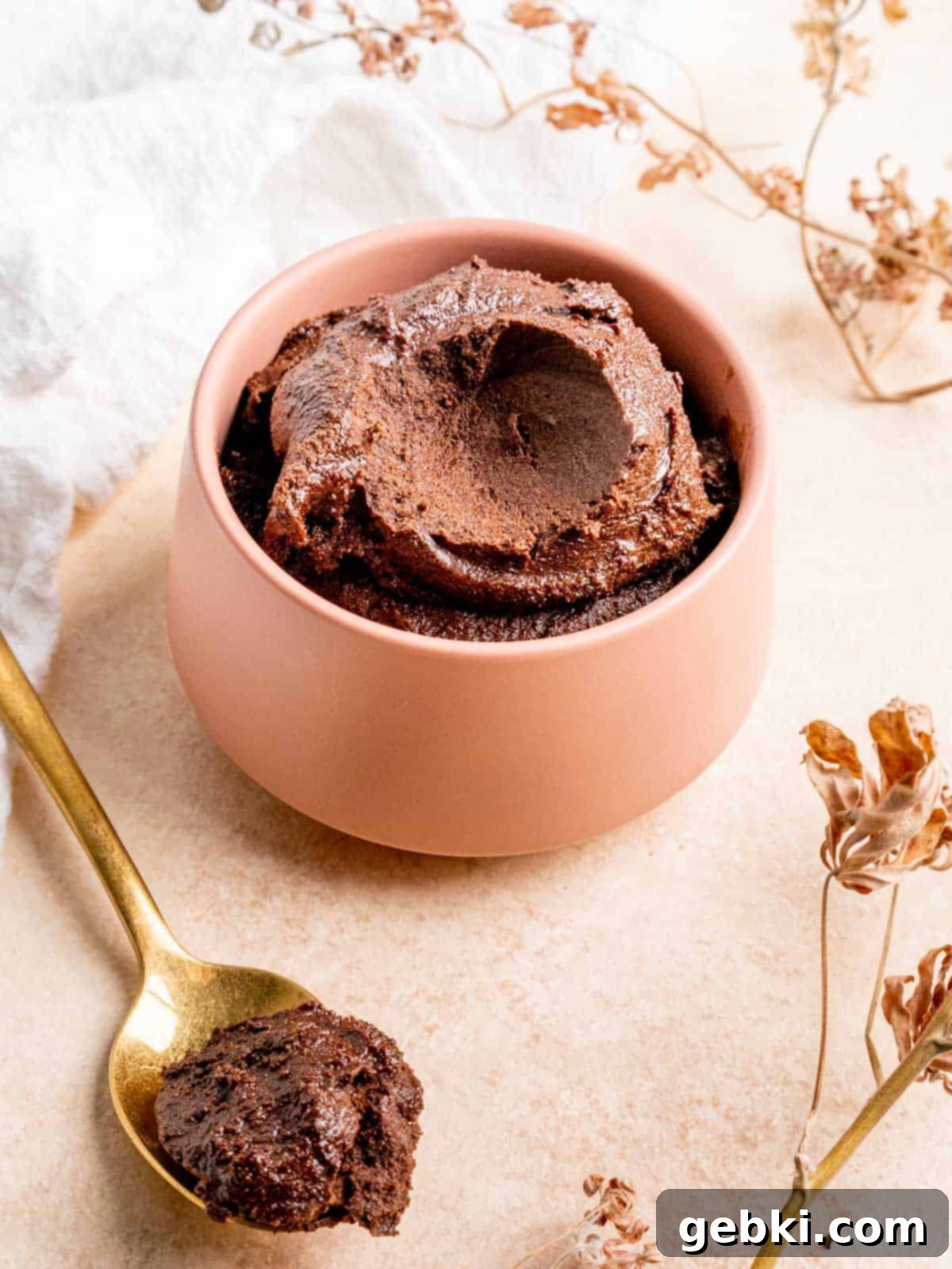 Spoonable Brownie Delight 9 a bowl of edible brownie batter with a spoonful taken out of it