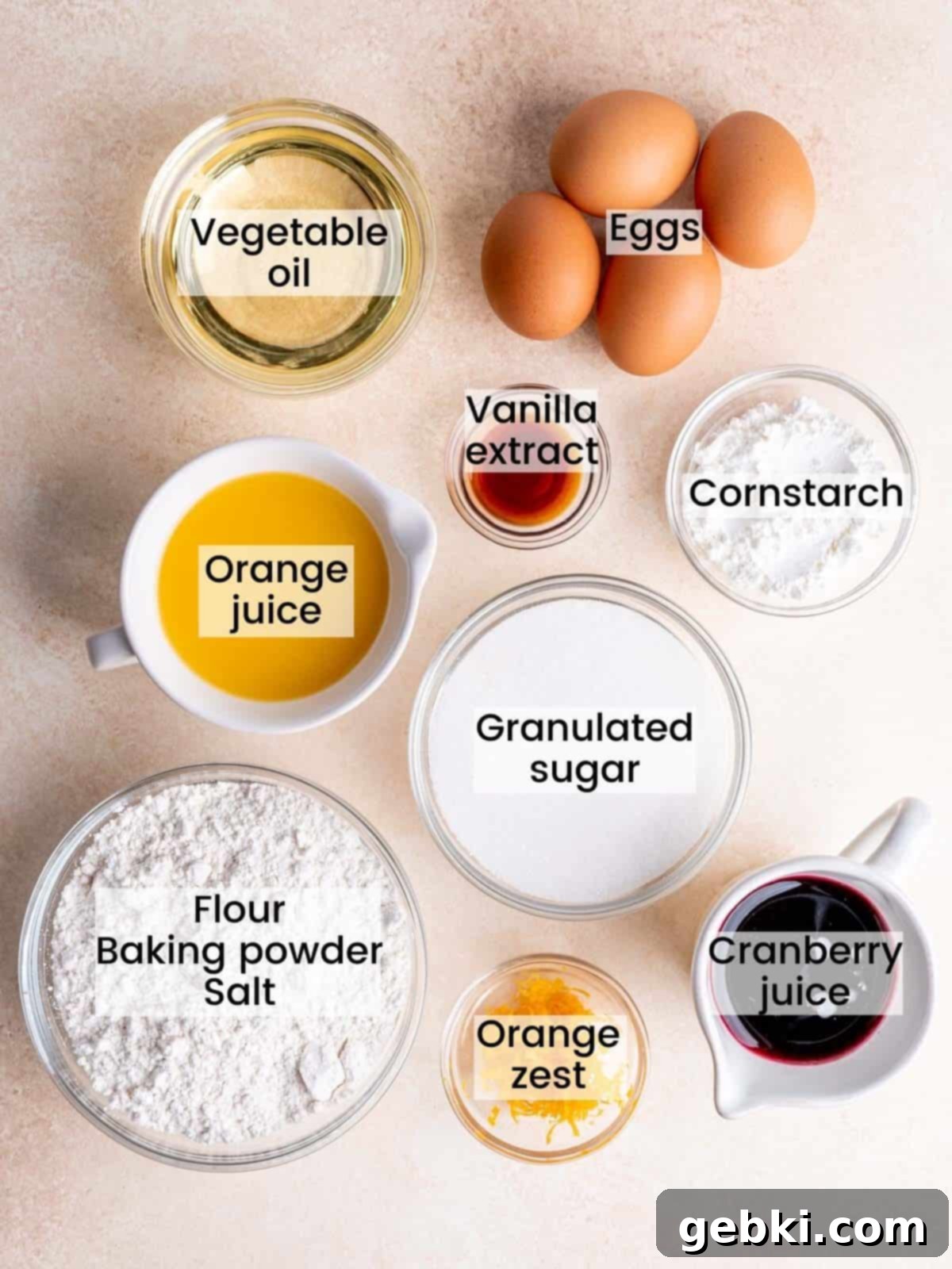 Zesty Orange Bundt with Tart Cranberry Glaze 3 Labeled ingredients for Orange Bundt Cake and Cranberry Glaze, including eggs, granulated sugar, vanilla extract, vegetable oil, orange juice, orange zest, all-purpose flour, cornstarch, baking powder, salt, and cranberry juice
