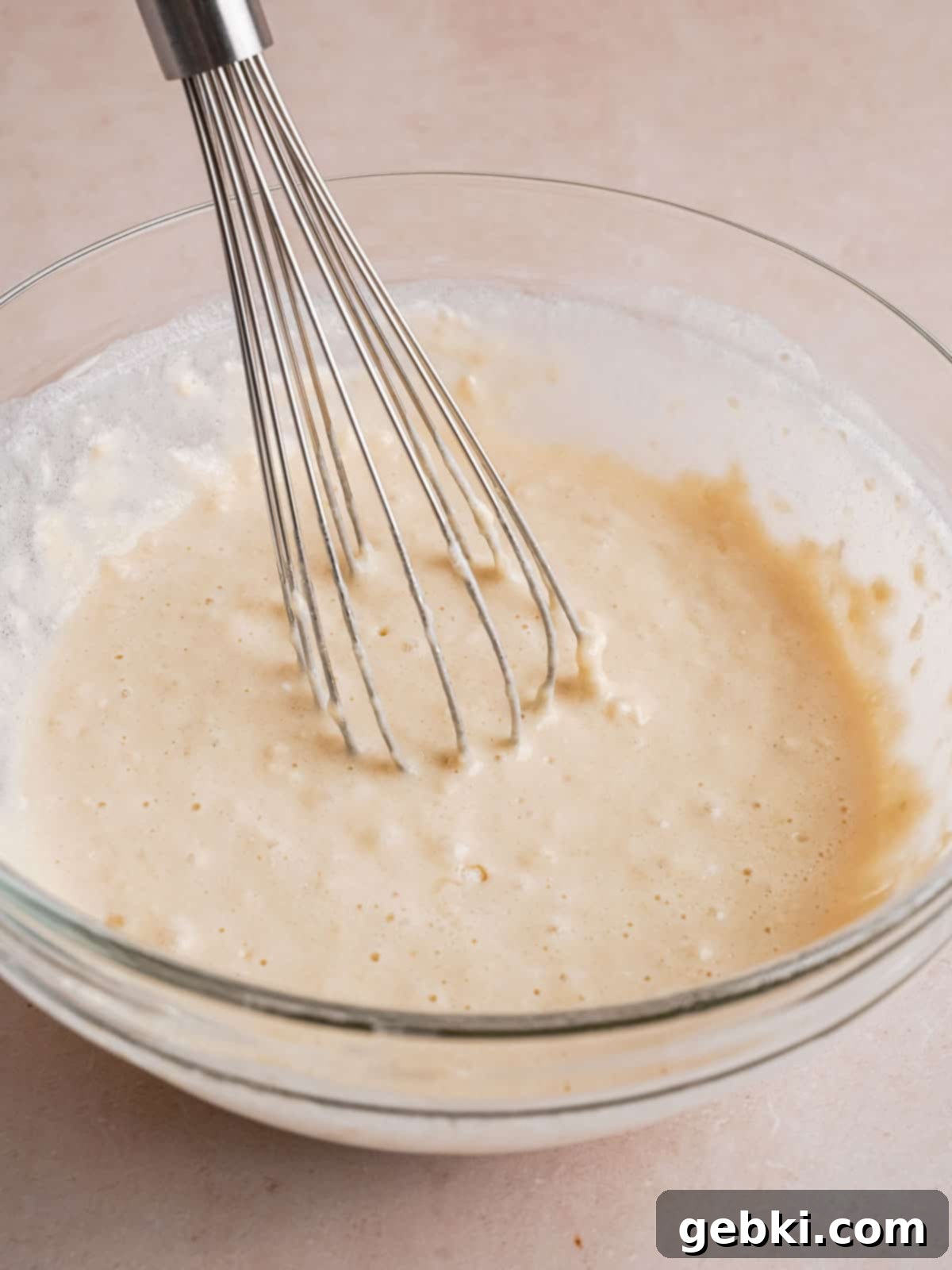 Fluffy Golden Homemade Belgian Waffles 6 Gently whisking waffle batter in a bowl until just combined with a few small clumps remaining.