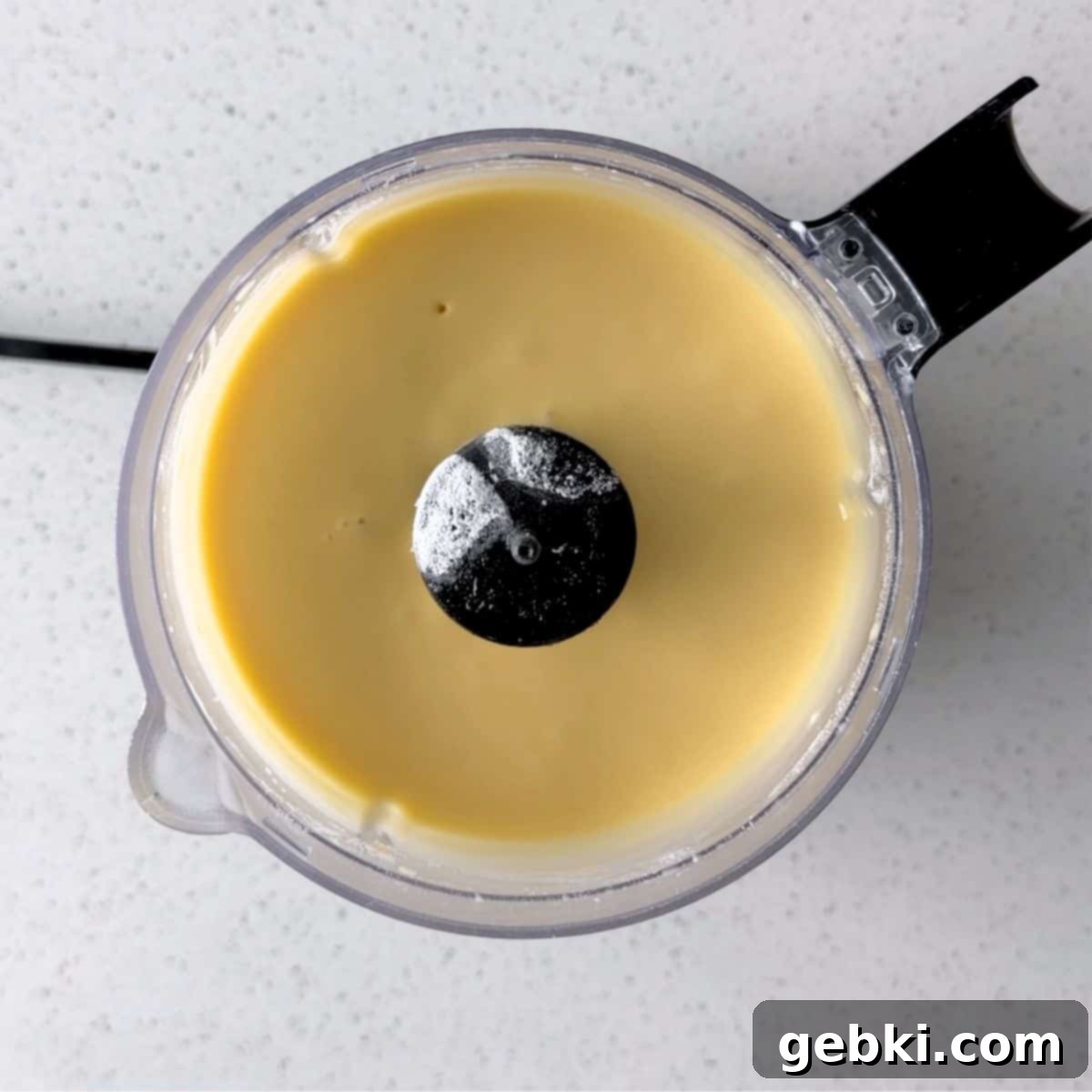 Strawberry Nutella Dream Crepes 4 Close-up shot of crepe batter being processed in a food processor.