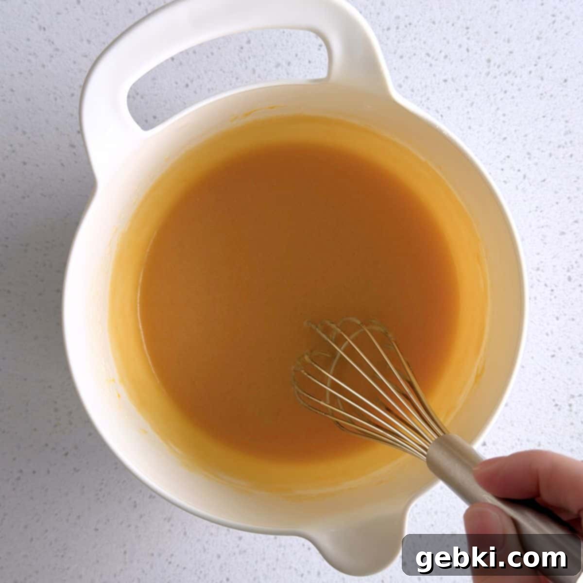 Mini Honey Muffins
Tiny Honey Bites of Joy 5 Egg, sugar, honey, vanilla extract, and cooled butter mixed in a bowl, creating a luscious base for the muffins.