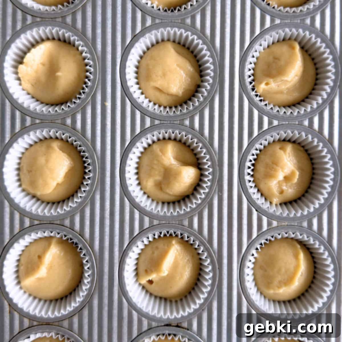 Mini Honey Muffins
Tiny Honey Bites of Joy 7 Mini muffin cups filled evenly with honey muffin batter, ready to be baked to golden perfection.