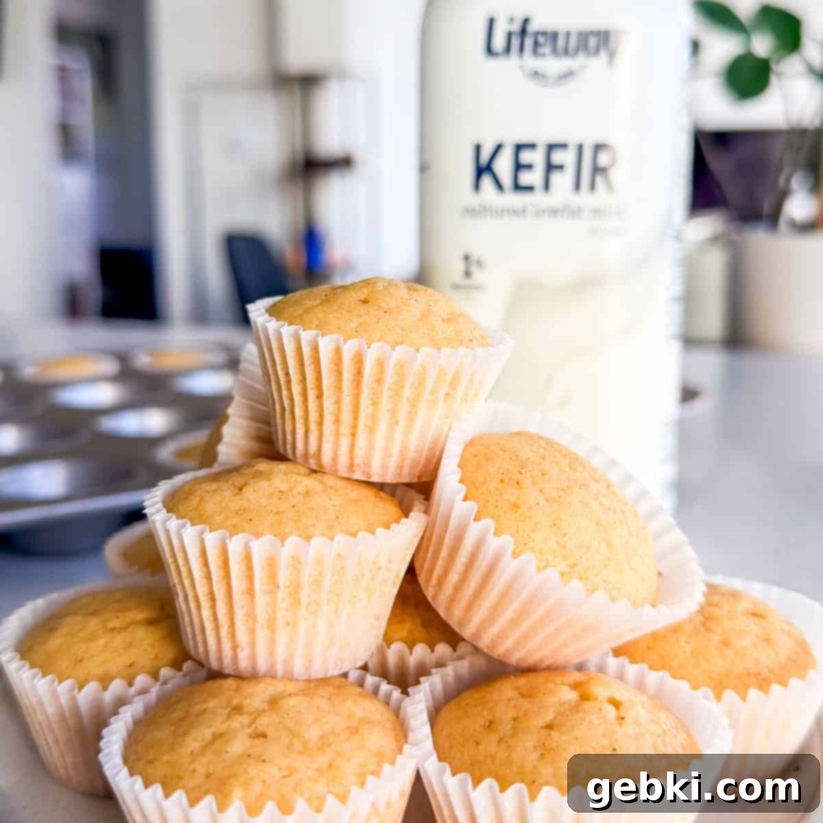 Mini Honey Muffins
Tiny Honey Bites of Joy 9 Mini honey muffins stacked in front of a bottle of Lifeway kefir, showcasing the key ingredient in this recipe.